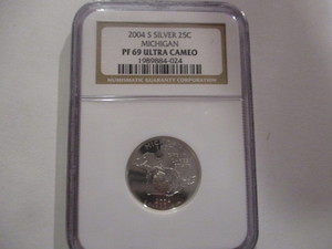 lot 43 image: NGC Certified 2004-S (San Francisco Mint) Proof 69 Ultra Cameo Michigan Silver Quarter #1989884-024