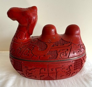 lot 96 image: Vintage Molded Red Plastic Chinese Two-Hump Recumbent Camel