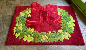 lot 157 image: Two Festive Rugs