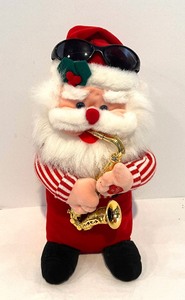 lot 404 image: Bundles of Christmas Decor including Kurt Adler Musical Santa Clause Figurine