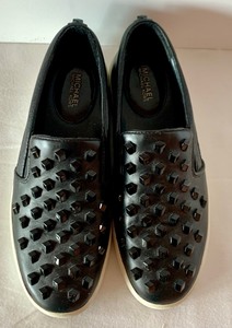 lot 225 image: Fun Black Michael Kors Studded Sneakers