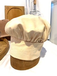 lot 290 image: Chef Hat with Hat Stand, Grilling Baskets, Vintage Wood Platters and More