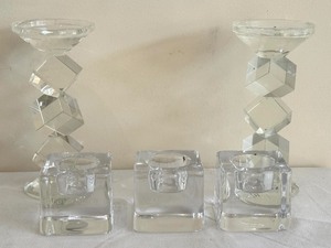 lot 495 image: Three Orrefors Candle Holders Laugh Often, Live Well and Love Much & Pair of Stacked Cube Crystal Candle Holders