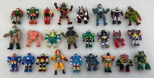 lot 81 image: Misc. Vintage Miniature Rubber Robots And Including Dino Core & More