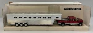 lot 211 image: 132  Scale Die-Cast F-350 Super Duty With Horse Trailer (Pre-Owned Displayed With Original Box)