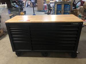 lot 1 image: Husky Tool Storage 62 in. W Heavy Duty Matte Black Mobile Workbench Cabinet with Adjustable Height Wood Top Customer Returns See Pictures