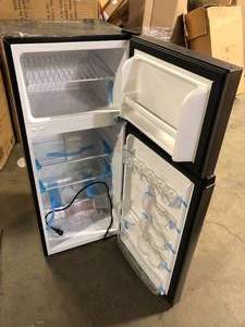 lot 43 image: Magic Chef 18.5 in. W, 4.5 cu. ft. 2-Door Mini Refrigerator, with Freezer in Platinum Steel  Customer Returns See PicturesMagic Chef 18.5 in. W, 4.5 cu. ft. 2-Door Mini Refrigerator, with Freezer in Platinum Steel  Customer Returns See Pictures