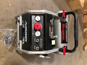 lot 47 image: Husky 4.5 Gal. Portable Electric-Powered Silent Air Compressor   Customer Returns See Pictures