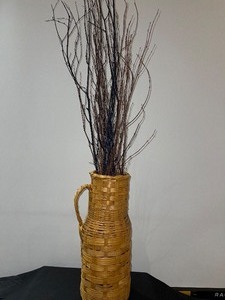 Wicker Basket with Tree Branches