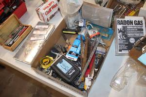 lot 807 image: Lot of (1 Box) Misc Hand Tools - Padlocks with Keys, Xacto Knife Set with Wood Case, Saw Blades, Silicone, Radon Gas Test Kit