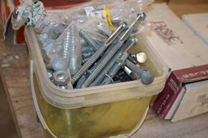 lot 835 image: Lot of (1 Pail) Assorted Bolts, Lag Screws, Anchors