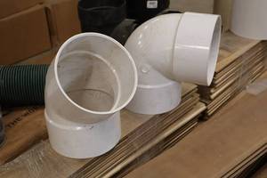 lot 998 image: Lot of (2) 6 PVC Elbow Pipe Connectors
