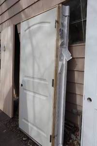 lot 1108 image: Solid Core Exterior 2-Panel Door 35-34x79