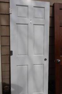 lot 1113 image: Solid Core 6-Panel Door 29-34x79-34