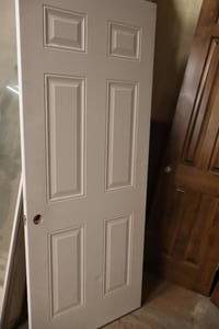 lot 1122 image: Solid Core Entry 6-Panel Door 31-34x79