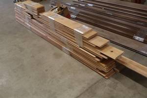 lot 1875 image: Lot of  Assorted Pieces of Flooring & Millwork - Baseboard, Crown Moulding