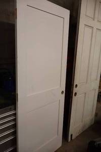 lot 1143 image: Solid Core 2-Panel Door 31-34x80