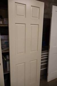 lot 1144 image: Solid Core 6-Panel Door 30x80