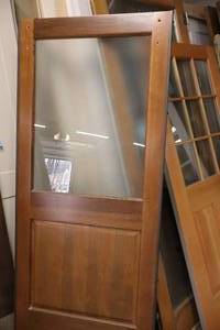 lot 1149 image: Solid Core Slider Door 35-34x80 with Glass Window and Metal Trim
