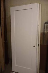 lot 1151 image: Solid Core 1-Panel Door 31-34x80
