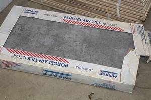 lot 1933 image: Lot of (1 Box) Mirage Porcelain Tile 24x12 7-count ( 7 total items )