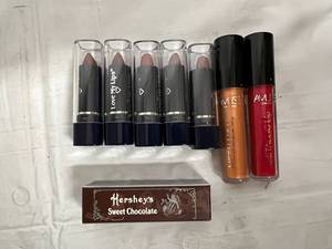 lot 37 image: 7 Tubes of Lipstick and 1 Sunscreen Lip Balm - Cocoa Bean, Wild Berry, and Pure Plum