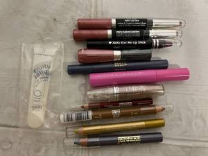 lot 35 image: Lipstick, Lip Gloss, and Eye Shadow Products