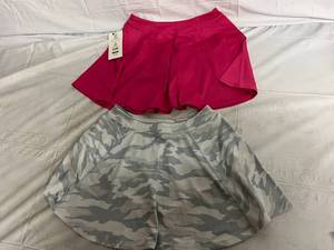 lot 64 image: 2 Sports Skorts - Pink and White Camo - Size Medium