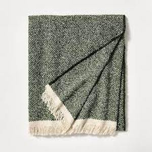 lot 74 image: Herringbone Frayed Edges Throw Blanket - Threshold designed with Studio McGee-Green
