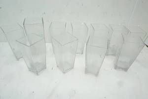 lot 23 image: 11 Square Vases