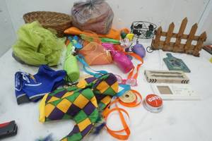 lot 32 image: Mardi Gras Color Tulles, Ribbons, Hat, Cooling Fans, Small Planter, Small Wooden Decor Fence, 3 small wooden decor