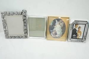 lot 51 image: Variety of Picture Frames & Angel Picture