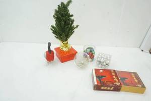 lot 62 image: Balancing Porcelain Goose, CDs (Different Language), Christmas Decor