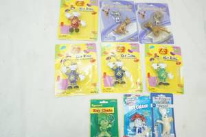 lot 68 image: Variety of Keychains Taco Bell Dog, Jelly Belly and more