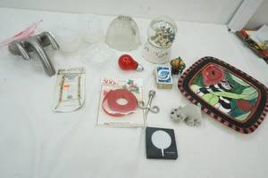 lot 114 image: Swak Clancy Cat Plate, Snow Globe, Faucet, Red Ribbon, small white dishes with covers and more