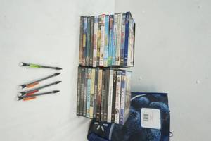 lot 135 image: Variety of DVD Movies, Blue Bag, 4 mechanical Pencils