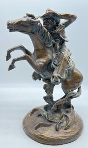 lot 199 image: CHEYENNE ORIGINALS - PETER APSIT Cowboy Chalkware Sculpture