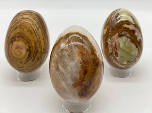 lot 276 image: Set of 3 - Natural Geode Stone Eggs - Browns