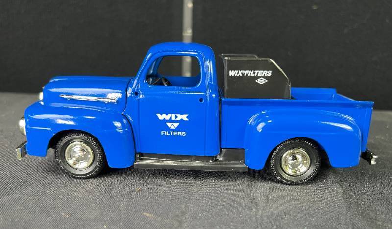 lot 89 image: Ertl Wix Filters 1951 Ford F-1 Truck Coin Bank Die-Cast