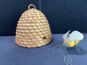 lot 1567 image: WOVEN VINE HONEY BEE HIVE AND BEE