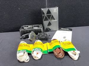 lot 1592 image: PHONE HOLDER AND EXTENSION CORDS NOS