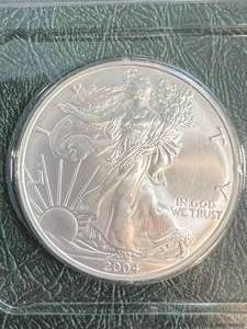 2004 AMERICAN SILVER EAGLE 1 TROY OZ .999 FINE SILVER UNC IN INFO CASE