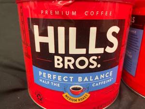 lot 12 image: Hills Bros Half the Caffeine 2 X 23oz tins Best by 11182023