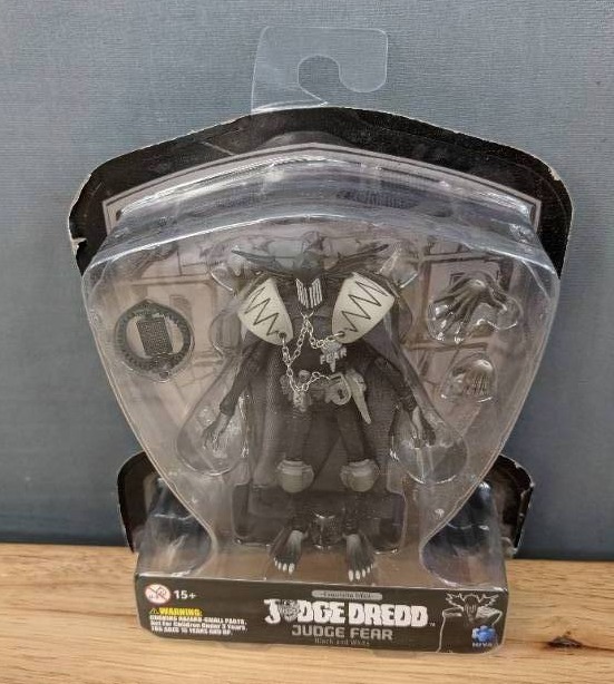 lot 92A image: Brand New Collection of Action Figures and Stands Judge Dredd,  F