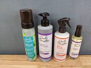 lot 77B image: Carols Daughter Hair Care Bundle Gel to Foam Styler, Shampoo, Curl refresher Spray, and Hair Sheen Package Retails for $69.23 I