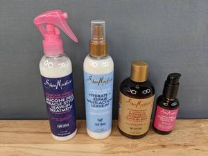 lot 79B image: Brand New SheaMoisture Hair Care Bundle Leave-In Treatment, Leave-In Conditioner, Leave-In Hydration Oil, and Jamaican Black Castor Oil Package Retails for $49.46 I