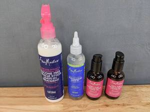 lot 147 image: (4) Brand New Shea Moisture Products (Silicone-Free Miracle Styler Leave-In Treatment, ACV Anti-Dandruff Leave-In Treatment, 100% Pure Jamaican Black Castor Oil) Retails for $53.00 I