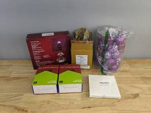 lot 71 image: Assorted Christmas Lighting - Angel Tree Topper, Icicle Lights, Replacement Bulbs, and more F