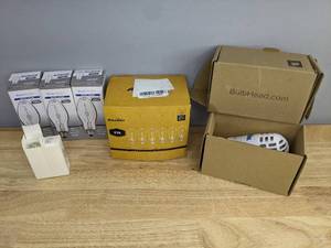 lot 95 image: New Light Bulbs 100W Bluex Bulbs, Ascher 6W Edison, Ozzkso 265V and 1 Atomic Zapper Q