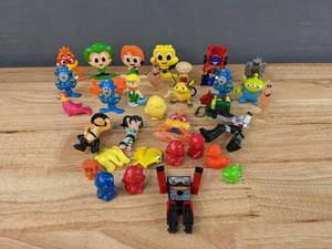 lot 90 image: Assorted Small Toy Figures - Cereal Characters, Pokemon, Transformers, The Jetsons, and more E
